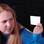 Girl holding note